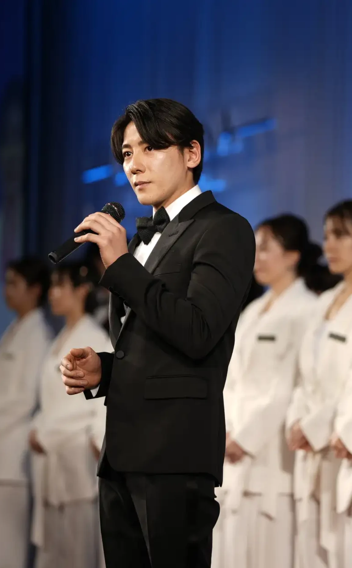 イベントに登壇する社長の写真